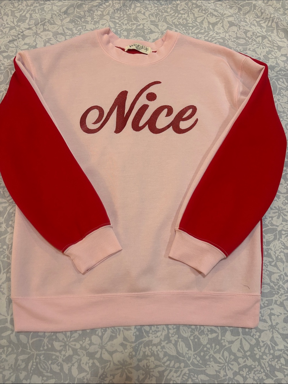 Wound Up Nice or Naughty Crewneck Sweatshirt in pink and red, Size M (8-10)